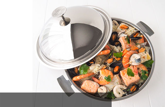 La Poêle Paella avec son couvercle cloche en inox 18/10