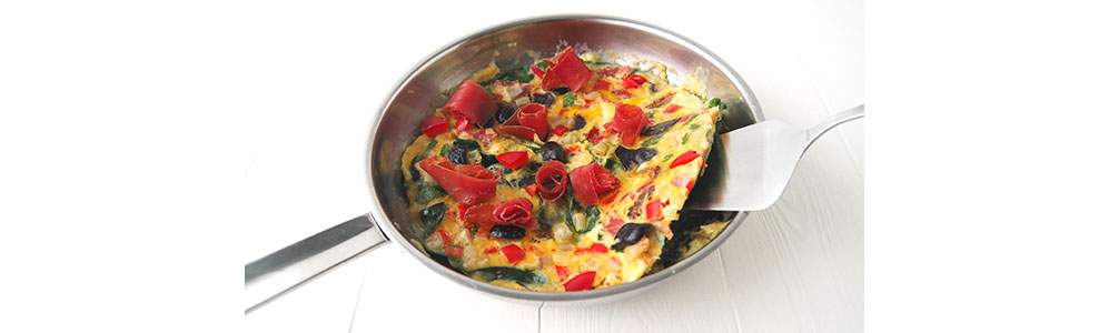 Omelette en cuisson douce sur son lit d&rsquo;épinards
